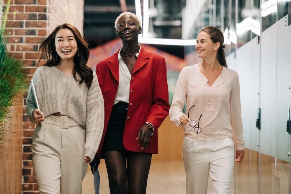 diverse group of women walking down hallway cyber security resources for women